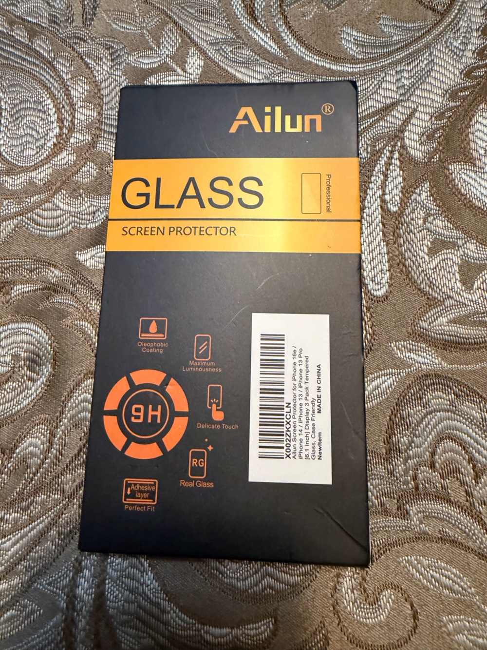 Ailun Glass Screen Protector in Black and Orange Packaging